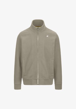 Giacca zip-up grigia chiara con colletto alto, polsini a coste, due tasche frontali e un piccolo logo sul lato sinistro del petto. Tessuto liscio.