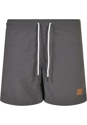 Graue Schwimmshorts aus leichtem Stoff, mit elastischem Bund, weißem Kordelzug und einem kleinen braunen Logo-Patch an der Seite.