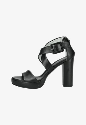 Sandalo in pelle nera con tacco alto a blocco, suola con platform, punta aperta e cinturino alla caviglia con fibbia quadrata.