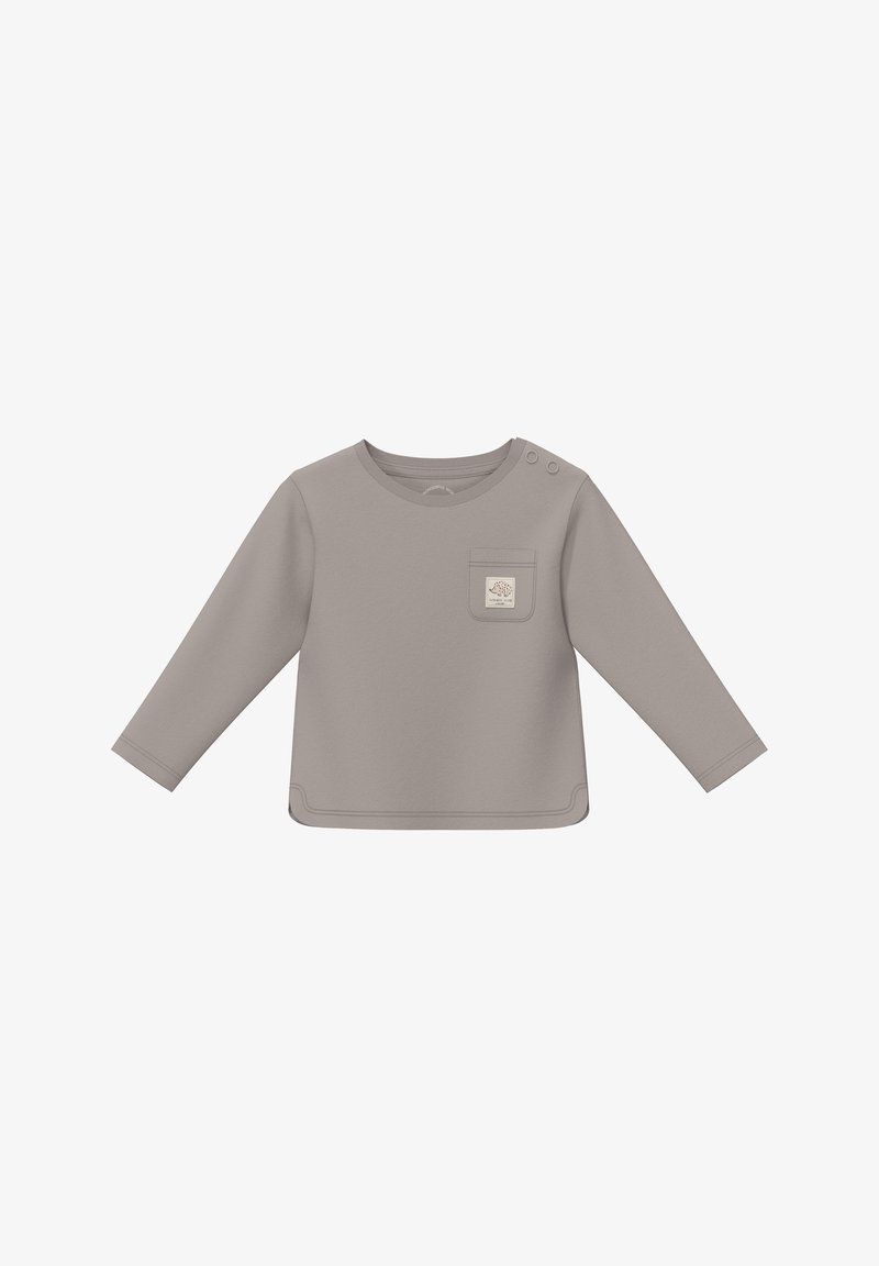 Dugih rukava majica od svijetlosive tkanine s okruglim izrezom, detaljima na ramenima s drapcima i prednjim džepom s logotipom.