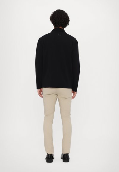 Filling Pieces UNISEX - Veste légère - black
