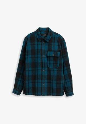 Knäpp-upp flanellskjorta med svart och blå rutmönster, långa ärmar, en bröstficka och klassisk krage. Mjuk tygtextur.