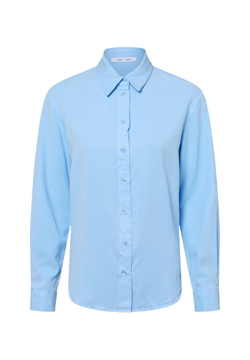 Light blue button-up shirt made of soft fabric. Features a pointed collar, long sleeves, and a front button closure with matching buttons.
