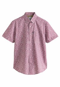 Camicia a maniche corte in rosso sbiadito con motivi floreali bianchi, colletto a bottoni e orlo dritto. Realizzata in tessuto leggero.