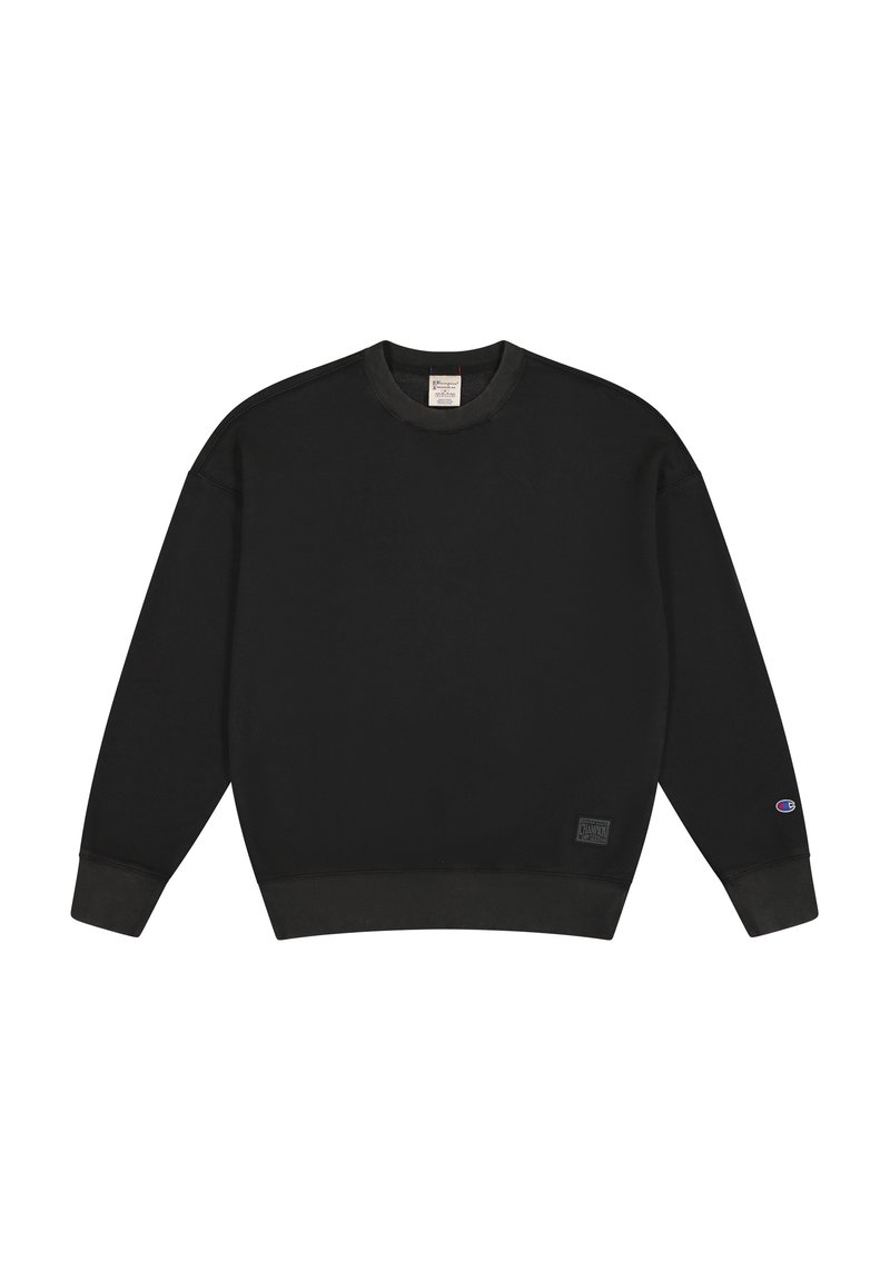 Sweatshirt noir à col rond, avec des poignets et un bas côtelés. Il présente un écusson logo sur le bas avant et un petit logo sur la manche.