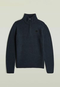 Donkerblauwe gebreide trui met halve rits, geribbelde textuur, lange mouwen en een klein rechthoekig logoviltje op de linkerborst.