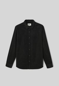 Chemise en velours côtelé noir avec un col boutonné, des manches longues et une surface texturée avec des lignes côtelées verticales.