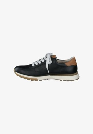 Black leather sneaker with white laces and a brown leather accent at the heel. Features a beige rubber sole with a textured tread pattern.