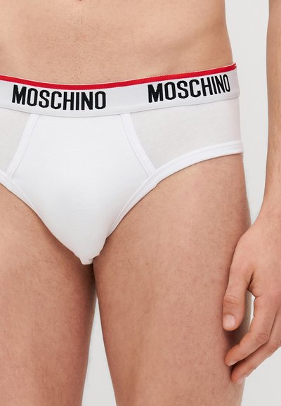Fehér pamut alsónadrág fekete és piros Moschino logós derékpánttal, sima textúrával és klasszikus szabású dizájnnal.