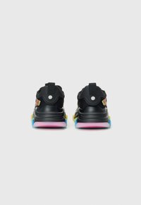 Black athletic shoes with a mesh upper, multi-colored accents, padded collar, and a cushioned sole featuring pink, blue, and yellow details.