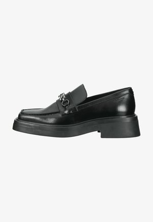 Black leather loafer with a smooth finish, featuring a raised front panel, silver accent hardware, and a chunky rubber sole.