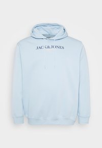 Light blue hoodie with a front pocket, drawstring hood, and "JACK & JONES" logo text across the chest in dark blue.