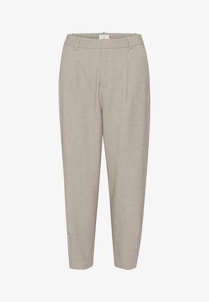 Beige, schmal zulaufende Hosen aus leichtem Stoff mit Seitenschlitzen, einem Bund und einem Saum, der sich am Knöchel verjüngt.