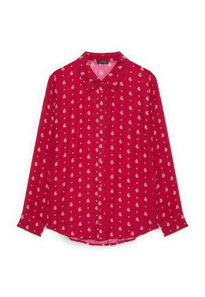 Czerwona bluzka na długi rękaw z guzikami, wzorem paisley w białym kolorze oraz małymi kropkami, z wywijanym kołnierzykiem i mankietami na rękawach.