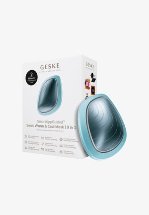 GESKE Sonic Warm & Cool maske med blåt buet design ved siden af sin hvide æske, der viser 9-i-1 ansigtsteknologifunktioner og prisemærker.