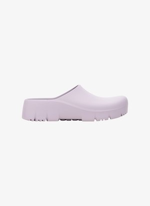 Lilac rubber clog with a smooth surface, rounded toe, low back, and thick ridged sole for traction. Simple design without additional accents.