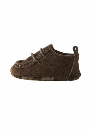Brown suede baby shoe with stitched moccasin design, lace detail, and soft sole with camouflage pattern, viewed from the side.