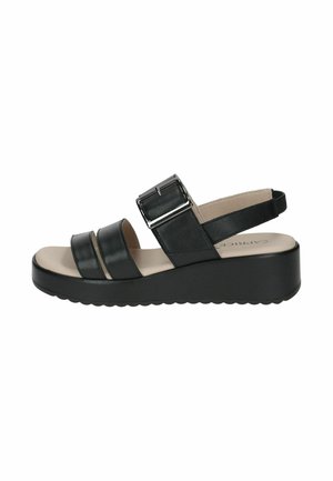 Schwarze Keilsandalen aus Leder mit drei Riemen über dem Vorderfuß, einer verstellbaren Schnalle und einer strukturierten Sohle für besseren Halt.
