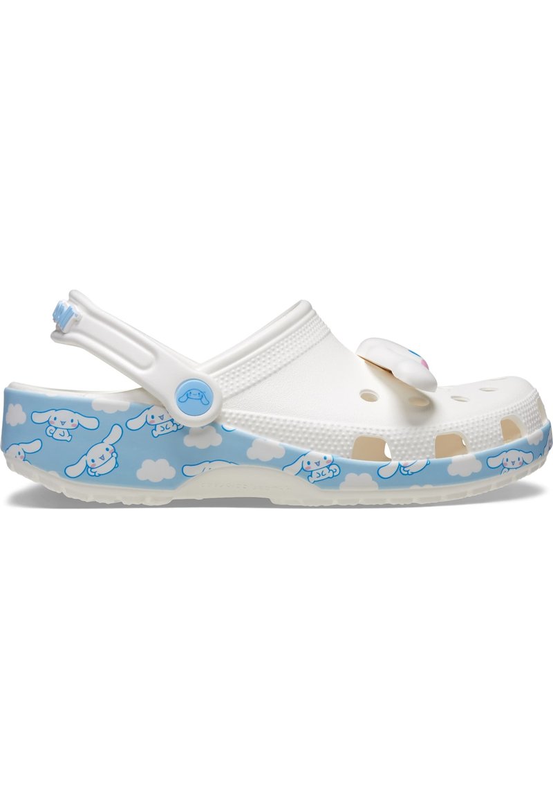 White clogs featuring a light blue base with cloud and cartoon dog pattern. Made of lightweight material with ventilation holes and a strap.