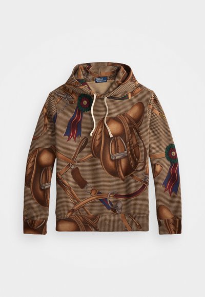 Rjava kapuca s houndstooth vzorom z natančnimi odtisi konjeniške sedle, stopal in traku, z belimi vrvmi in oznako Polo Ralph Lauren.