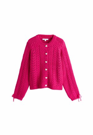 Fuchsia knitted cardigan featuring a round neckline, heart-shaped buttons, cable knit design, and ribbed cuffs with ties.