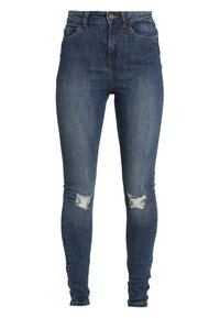 Jeans skinny a vita alta in denim blu scuro. Presentano strappi vintage sulle ginocchia, cinque tasche e chiusura con bottoni.