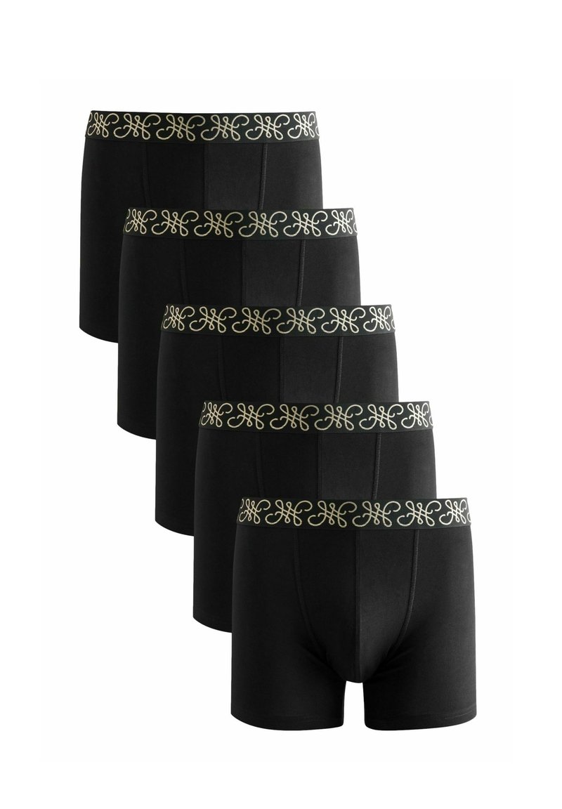 Boxer shorts negros con cinturilla elástica decorativa de patrón dorado, que presentan un diseño ajustado y una textura de tela suave.