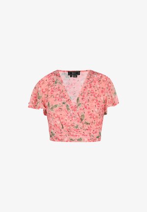 Rózsaszín virágmintás crop top V-nyakkivágással, rövid fodros ujjakkal és ráncolt derékkal. A dizájn könnyű, áttetsző anyagot tartalmaz, finom mintázattal.