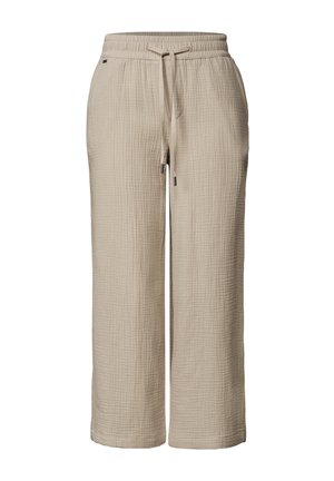 Pantalon beige à jambe large texturé avec ceinture élastique et cordon, poches avant et coupe décontractée.
