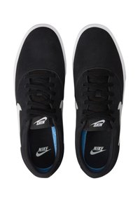 Black suede Nike sneakers with white rubber soles, black laces, and a white swoosh logo on the side. Internal blue accent on the insoles.
