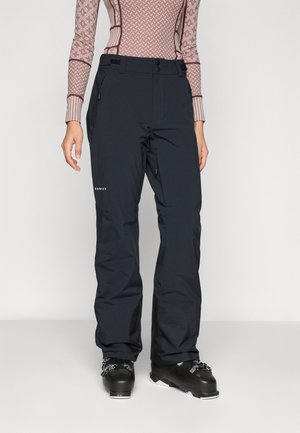 Pantaloni da sci navy realizzati in tessuto resistente, con una vestibilità dritta, tasche laterali con zip, passanti per cintura e logo impresso sulla gamba sinistra.