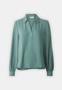 Blusa a maniche lunghe di colore verde salvia con scollo a V, colletto e tessuto testurizzato. Presenta polsini arricciati e una vestibilità comoda.