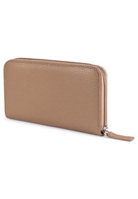 Tan leather wallet with a textured surface, zip-around closure, and a small leather pull tab. Sleek rectangular design, no visible hardware.