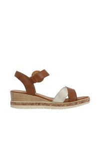 Sandale compensée marron et beige avec une semelle à motifs, une bride à la cheville et un élément circulaire décoratif sur le côté.