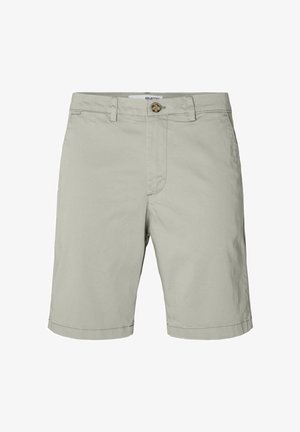 Heledad hallid lühikesed püksid, mis on valmistatud puuvillast, nööbiga kinni ja vöökohaga. Omavad sirgeid jalgu ja puhta äärega.