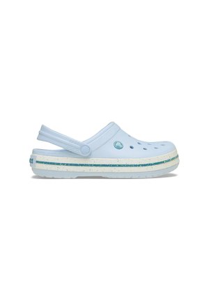 Light blue clog with ventilation holes, raised heel, and a white sole featuring multicolored speckles and a blue accent stripe.