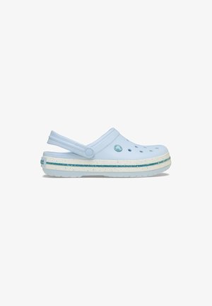Light blue clog with ventilation holes, raised heel, and a white sole featuring multicolored speckles and a blue accent stripe.