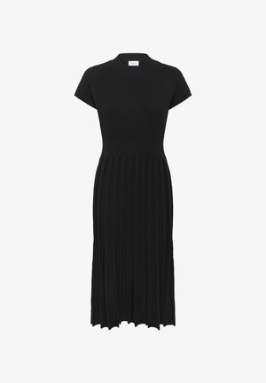 Mustmust räägitud kleit lühikeste varrukatega, keha liibuv kehaosa ja plisseeritud seelik. Omab ümmargust dekolteed ja soonikust tekstuuri ülemises osas.