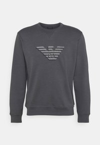 Mörkgrå sweatshirt med rund halsringning, långa ärmar och en strukturerad broderad logotyp med horisontella ränder på framsidan.