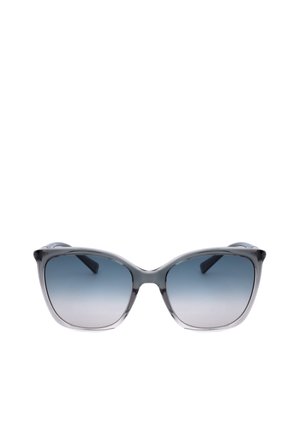 Occhiali da sole cat-eye grigi traslucidi con lenti sfumate blu, vista frontale su sfondo bianco.