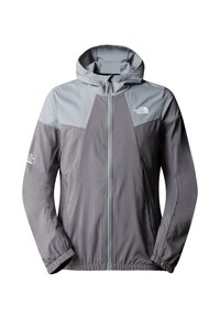 Harmaa kevyt takki, jossa on huppu, väriblokkimuotoilu tummemmista ja vaaleammista harmaista osista, elastiset hihansuut ja etuvetoketju.