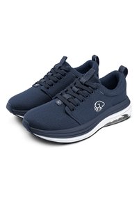 Navy blue sneakers with a soft, textured upper, round toe, and white midsole. Features laces and a small logo on the side.