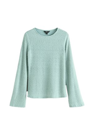 Maglione azzurro chiaro con texture, maniche lunghe e scollo rotondo. Realizzato in materiale morbido, con una vestibilità ampia e squadrata. Senza elementi hardware visibili.