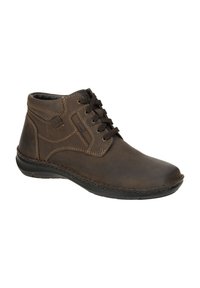 Botas de cuero marrón hasta el tobillo con cordones, que presentan costuras en contraste, puntera redondeada y una suela de goma flexible.
