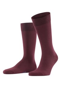 Calcetines de algodón burdeos de caña corta con puños acanalados y textura suave, con un logotipo azul cerca de los dedos del pie.