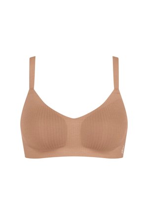 Soutien-gorge sans couture couleur peau avec bretelles fines réglables et motif texturé subtil, conçu pour le confort et le maintien.