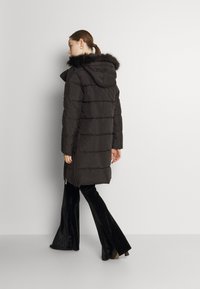 JDY JDYELI SUNNY LONG PADDED  - Casaco de inverno - black