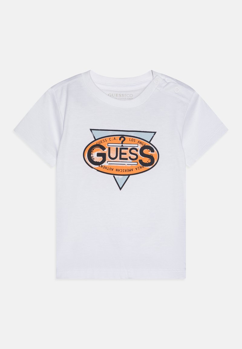 Balts kokvilnas T-krekls ar trīsstūrveida grafisko logotipu oranžā, melnā un zilā krāsā. Pogu aizdare uz pleca, lai vieglāk būtu uzvilkt.