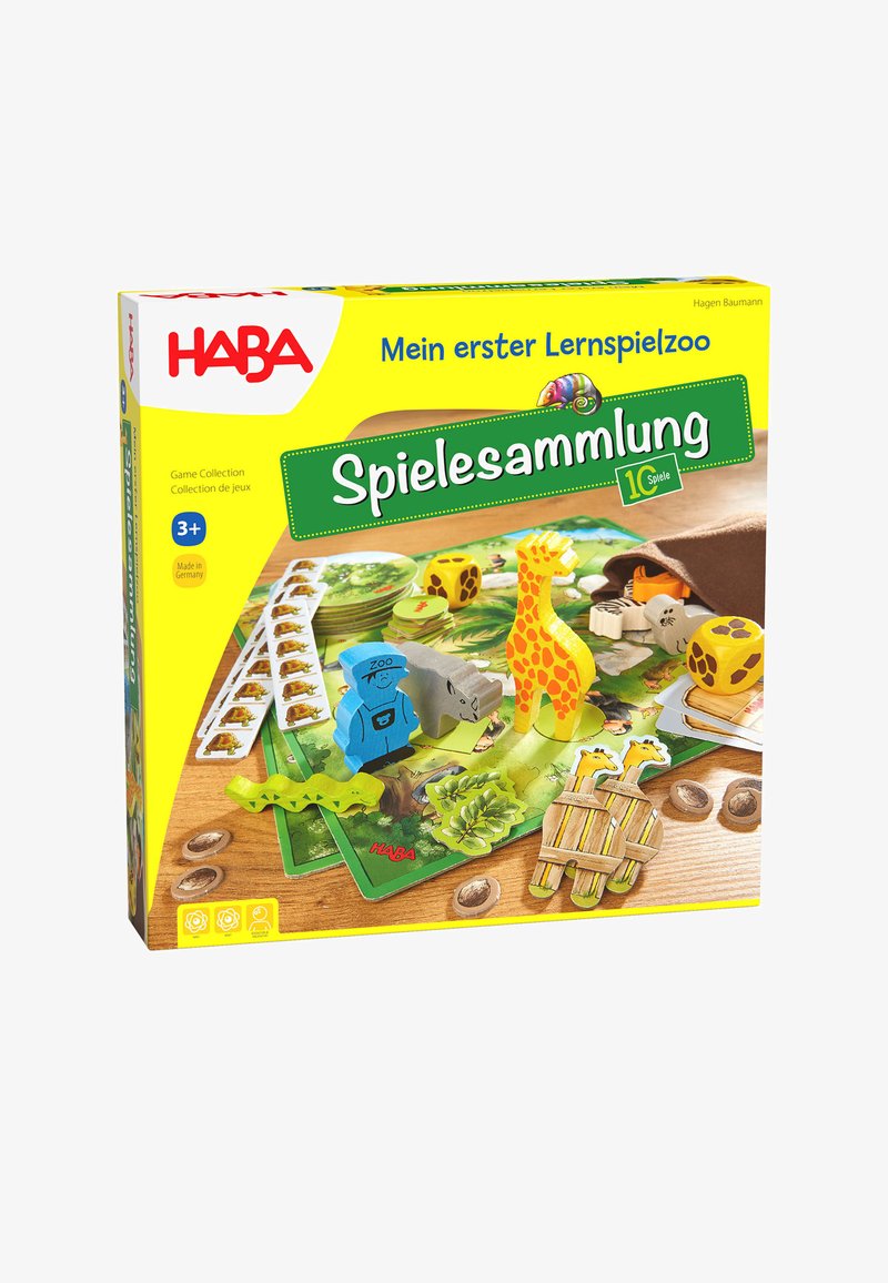 Colorful board game box featuring wooden animal pieces, bright yellow packaging, and illustrated game components on a green board.