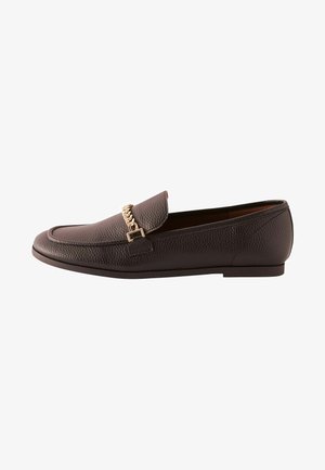 Brown leather loafers with textured finish, flat heel, and gold chain detail across the vamp. Sleek design, minimal stitching.